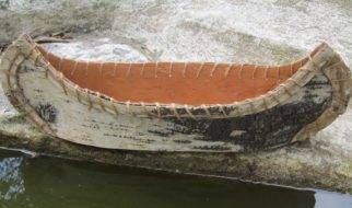 Blue Antiqued Furniture and a Birchbark Canoe