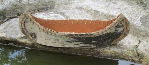 Blue Antiqued Furniture and a Birchbark Canoe